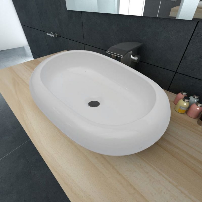 Luksuzni keramični ovalni umivalnik dimenzije 63 x 42 cm